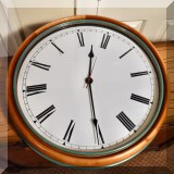 D04. Round wall clock with green frame. 